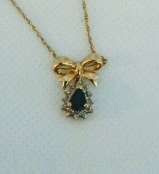 Diamond Studded Pear Shaped Sapphire 14 K Gold Bow Pendant Vintage