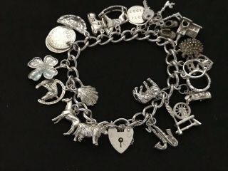 Vintage Sterling Silver Charm Bracelet With 21 Silver Charms.  61 Grams
