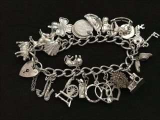 Vintage Sterling Silver Charm Bracelet with 21 Silver Charms.  61 grams 2