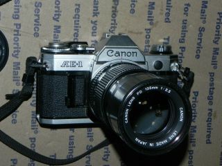 Vintage/antique - Canon Ae - 1 - 5639739 - 35mm Slr Camera W/135mm 1:3.  5 Canon Lens