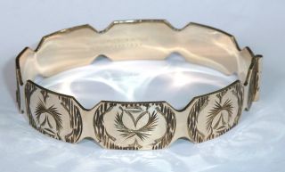 A Vintage 50 Micron 9ct Rolled Gold Opening Bangle With An Engraved Design
