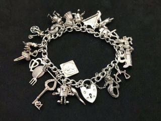 Vintage Sterling Silver Charm Bracelet With 21 Silver Charms.  36 Grams