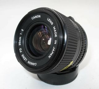 VINTAGE CANON FD 35MM F2.  0 WIDE ANGLE LENS FOR F1,  AE - 1,  A1. 2