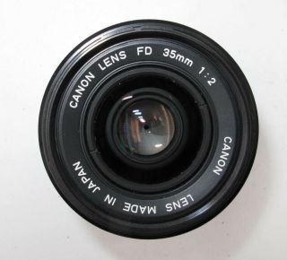 VINTAGE CANON FD 35MM F2.  0 WIDE ANGLE LENS FOR F1,  AE - 1,  A1. 5