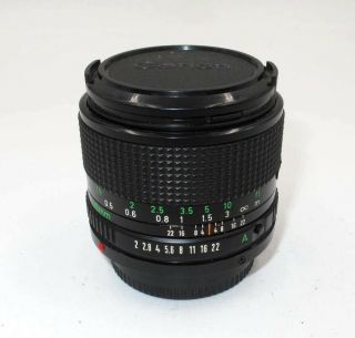 VINTAGE CANON FD 35MM F2.  0 WIDE ANGLE LENS FOR F1,  AE - 1,  A1. 7