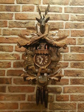 Vintage Black Forest Hunting Cuckoo Clock With Music Box And Dancing Figurines