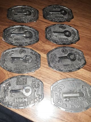 Vtg.  Limited Edition Switch Key Belt Buckle From Adezy Ent.  Inc.  Set Of 8