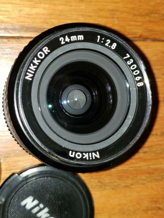 Vintage NIKON NIKKOR 24mm f:1:2.  8 with Lens Caps No.  730068 2