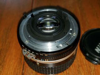 Vintage NIKON NIKKOR 24mm f:1:2.  8 with Lens Caps No.  730068 5