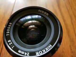 Vintage NIKON NIKKOR 24mm f:1:2.  8 with Lens Caps No.  730068 7