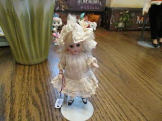 About 4.  5 " Precious Antique Bisque Migonette Doll German Porcelain Doll
