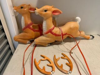 Vintage Two Large Blow Mold Santas Reindeer For Sleigh W/ Two Straps & Antlers