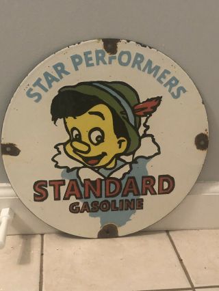 Vintage Porcelain Standard Oil Disney Pinocchio Sign Pump Plate Star Performance