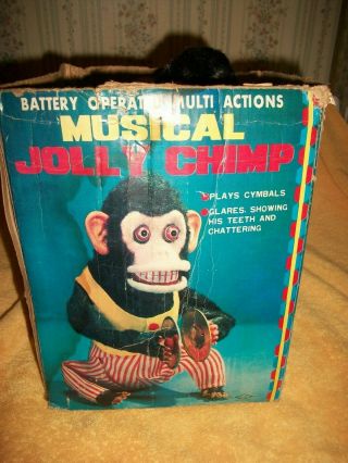 VINTAGE MUSICAL JOLLY CHIMP IT ONLY CLAPS,  BOX IS MISSING THE TOP 2
