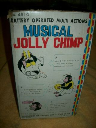 VINTAGE MUSICAL JOLLY CHIMP IT ONLY CLAPS,  BOX IS MISSING THE TOP 3