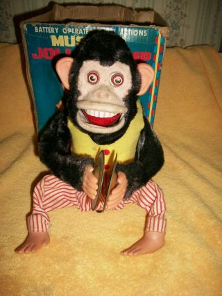 VINTAGE MUSICAL JOLLY CHIMP IT ONLY CLAPS,  BOX IS MISSING THE TOP 4