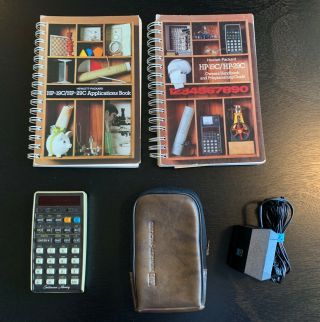 Vintage Hewlett - Packard 29C Calculator –– with charger,  case,  and manuals 2