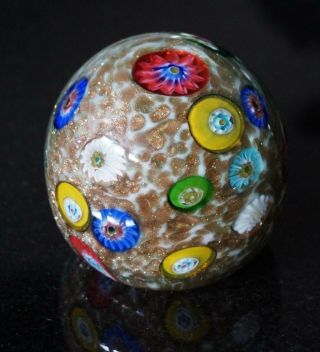 A Vintage Murano Glass Paperweight With Millefiori And Gold Background