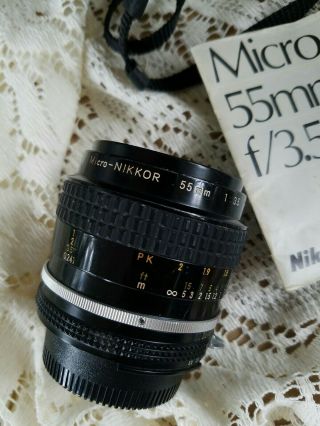 Vtg.  Nikon FM 35mm SLR Film Camera 3 Lenses Nikkor 55mm F/3.  5,  Tamron,  Promura 3