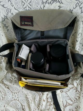 Vtg.  Nikon FM 35mm SLR Film Camera 3 Lenses Nikkor 55mm F/3.  5,  Tamron,  Promura 7
