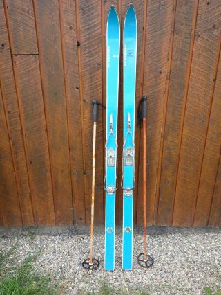 Vintage Wooden 65 " Long Skis With Metal Bindings And Light Blue Finish