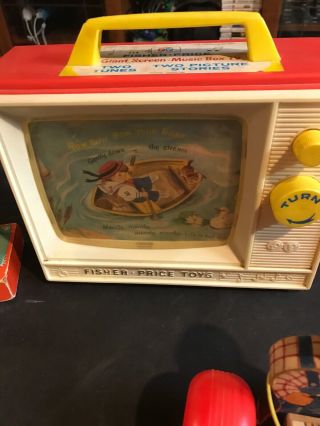 1960s FISHER PRICE VINTAGE MUSICAL TOY music box tv Clock Tractor Helicopter 4