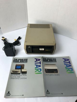Vintage Atari 810 Disk Drive With Manuals