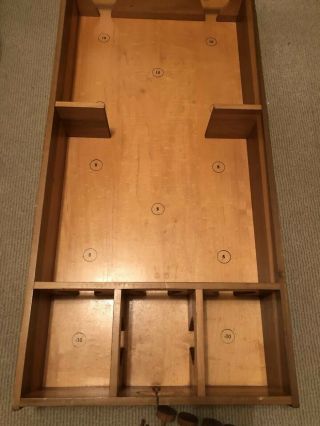 1960’s Wooden Vintage Skittles game.  Comes with 16 pins and 6 tops.  18.  5 x 45.  5” 3