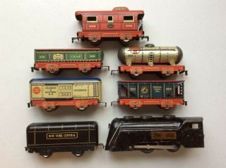 Vintage O Scale Marx 7 Piece Train Set With Red Bases And Commodore Locomotive
