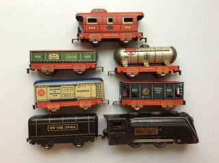 Vintage O scale Marx 7 piece train set with red bases and Commodore Locomotive 2