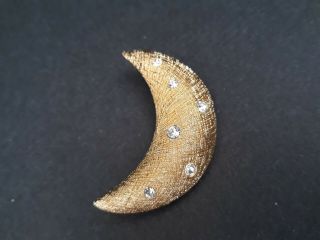 A Vintage Christian Dior Gold Tone Crescent Moon Rhinestone Brooch Pin