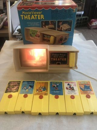 Vtg Fisher Price Movie Viewer Theater With 7 Cartridges Rare Games