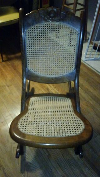 Vintage Foldable Wooden Rocking Chair.  Very Solid.  Upholstery Has Been Updated.