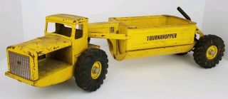 Vintage Nylint Yellow Pressed Steel Tournahopper Belly Dump Construction Tractor