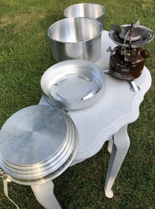 Sigg - Tourist With Coleman 400 Peak 1 Burner Vintage Cookware Set -