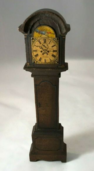 Tynietoy Grandfather Clock With Unique Face Of Flowers And Firecracker?