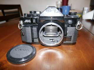 Vintage Canon A - 1 Camera with 3 lenses,  2x converter and metal case 2
