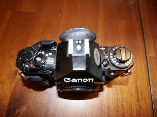 Vintage Canon A - 1 Camera with 3 lenses,  2x converter and metal case 4