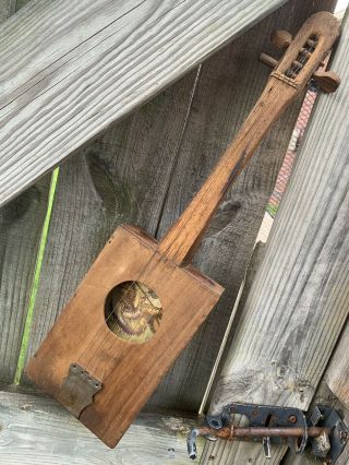 Primitive Wooden Cigar Box Guitar 4 String Yellow Cab Hand Carved Pegs Vintage