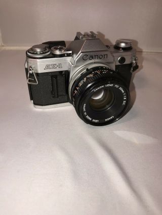 Vintage Canon Ae - 1 Slr 35mm Camera With 50mm Fd Lens In