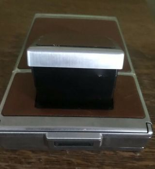 VINTAGE POLOROID SX 70 LAND CAMERA WITH LEATHER CASE AND FILM 7