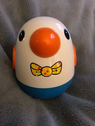 Vintage Playskool Roly Poly Penguin Musical Toy Bird Chime Wobble Bow Tie