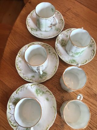 Antique/vintage Monbijou,  Germany 4 Saucers And 6 Tiny Cups.  Flowers With Gold