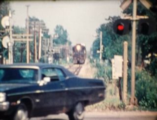 Vintage 16mm film - KEEP TRACK OF TRAINS - Train accidents in Iowa - Great COLOR 4