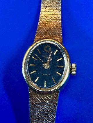 Vintage Ladies Gold Tone Timex,  Oval Face Watch - Battery