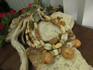 Vintage Gold Tone Cow Bovine Bone,  Seed Nut,  Wood Accents Calif.  Mark Necklace