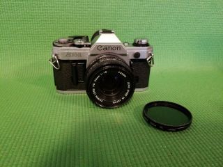 Canon Ae - 1 35mm Camera (1) With Two Fd 50mm 1:1.  8 Lenses