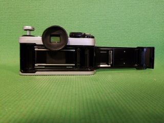 Canon AE - 1 35mm Camera (1) with Two FD 50mm 1:1.  8 Lenses 7
