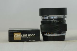 Olympus Zuiko Auto - S 55mm F1.  2 Lens With Cap & Hood