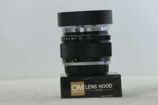 Olympus Zuiko Auto - S 55mm F1.  2 Lens with Cap & Hood 2